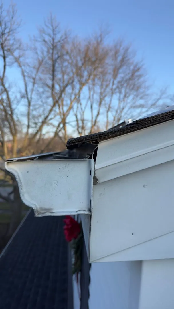New gutter and downspout after repair in Wheeling IL