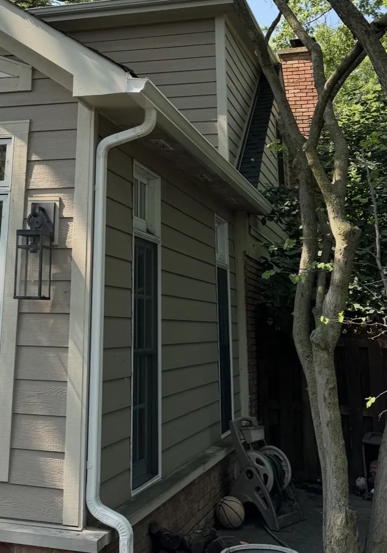 New seamless K-style gutters and downspout installed on a home in Glenview IL
