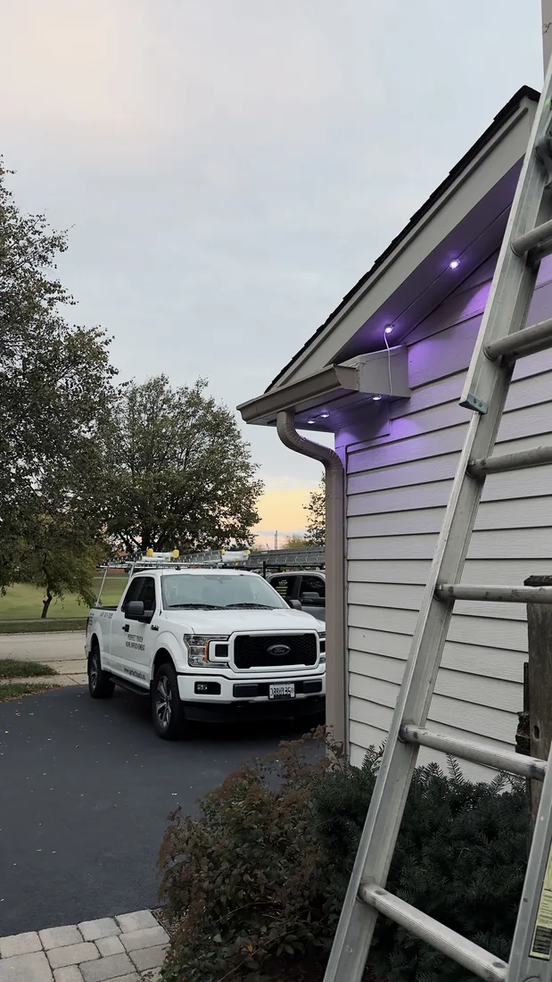 Permanent Govee roofline lighting on a Schaumburg, IL home — warm colors for Diwali and Christmas