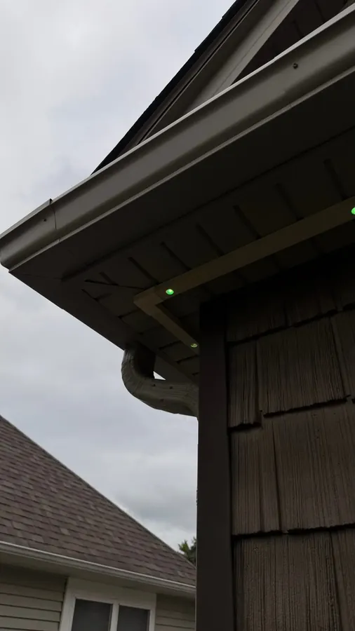 Govee permanent lights in a dark brown color-matched SnapTrack soffit channel - Perfect Touch
